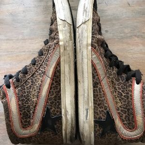 High top sneakers designed by Golden Goose.